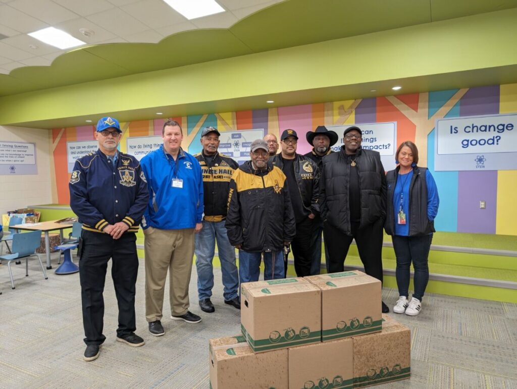 11/21/23 Donating food to school